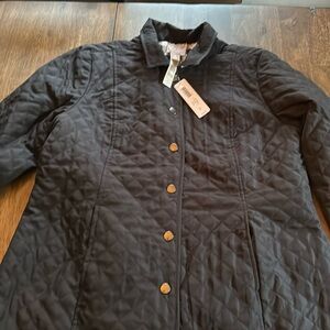 Black women’s jacket from Chico’s. Size 2 new with tags.